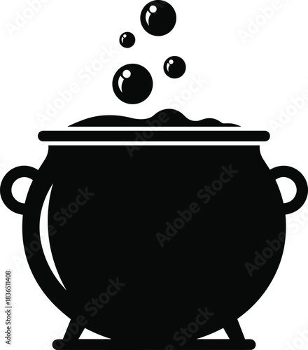 Traditional witch's cauldron bubbling with spell brew