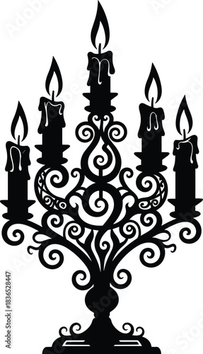 Ornate candelabra silhouette with five burning candles