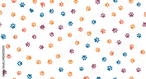 Seamless and playful pattern of colorful paw prints in blue, orange, and purple, randomly scattered on a simple white background.