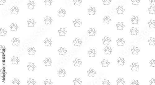 Subtle and simple seamless pattern of scattered gray paw prints with a textured, glitter-like effect on a clean white background.