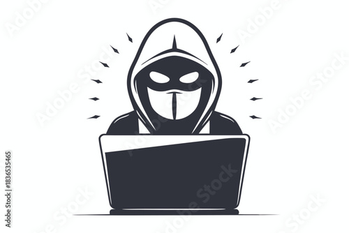 Silhouette of a cloaked hacker with laptop symbolizes online threats and network security