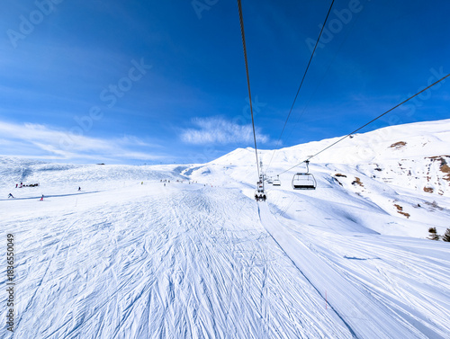 Mountains and skiing in Les Contamines, French alps.