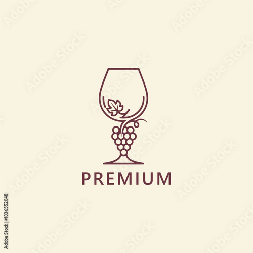 Premium wine logo with elegant glass, grapes, and leaf design.