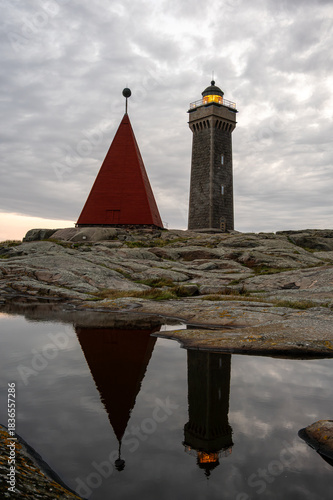 Vinga Lighthouse and Coastal Navigation Markers at Sunset, Sweden