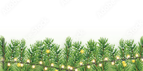Festive pine branches with snow and glowing string lights on white background