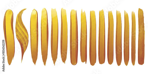 Golden paint brush strokes isolated on white background art design element
