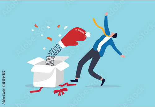 Being fired from job, unemployment and jobless, business failure or stock market bad news surprise investor concept, businessman open present box with surprise boxing glove punching knock out.