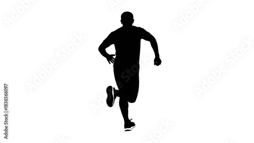 Dynamic silhouette of a basketball player mid jump ready to dunk against a stark black background for sports advertising