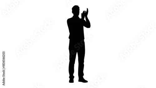 Mysterious silhouette of a person holding a small object or device against stark black background emphasizing privacy and anonymity