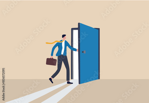 Open the door to find new opportunity, new job or get out of comfort zone, hope to find success, way to exit, escape to bright future concept, businessman open the door to see bright light coming in