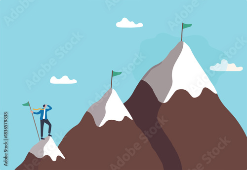 Ambition to success and achieve target, career growth or business goals, challenge to win, achievement or victory concept, motivated businessman reach mountain peak aiming to achieve higher targets.