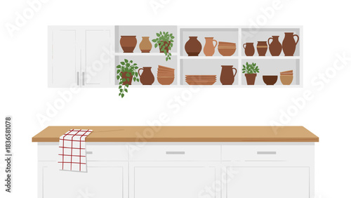 Charming rustic kitchen counter setup showcasing earthy pottery and vibrant green houseplants on white cabinetry