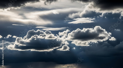 Dramatic storm clouds illuminated by sunlight