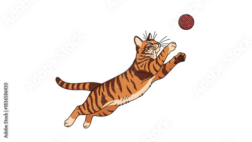 Energetic orange tabby cat leaps high into the air to playfully catch a small red ball of yarn