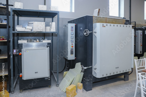 Digital display increases process stability. Annealing - Heat Treatment Furnaces . Industrial furnace with advanced control panel provides precise temperature control in production.