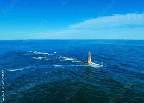 Aerial view of the lighthouse in the ocean