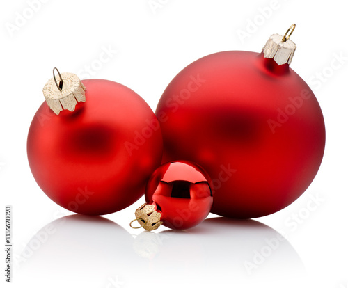 Three Christmas red baubles isolated on white background