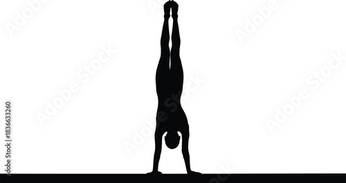 Silhouette of a person performing a perfect handstand, symbolizing strength and balance in fitness