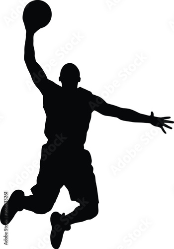 Silhouette of a basketball player jumping high in air to perform a slam dunk