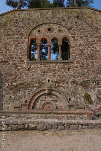 Mandelieu la Napoule, France - June 10, 2025 - medieval castle on the coast with stone walls and lush greenery