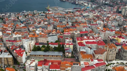 Aerial panorama view around the downtown in the harbor city Vigo in Spain on a cloudy summer afternoon.