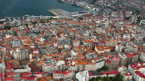 Aerial panorama view around the downtown in the harbor city Vigo in Spain on a cloudy summer afternoon.
