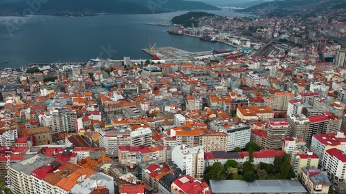 Aerial panorama view around the downtown in the harbor city Vigo in Spain on a cloudy summer afternoon.