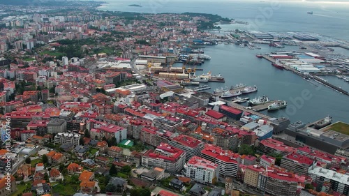 Aerial panorama view around the downtown in the harbor city Vigo in Spain on a cloudy summer afternoon.