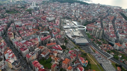 Aerial panorama view around the downtown in the harbor city Vigo in Spain on a cloudy summer afternoon.