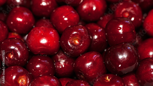 background of large ripe cherries. A large collection of fresh red cherries. Close-up of juicy berries, harvest season. Good harvest in the garden. healthy food, lots of vitamins, diet, vegetarianism