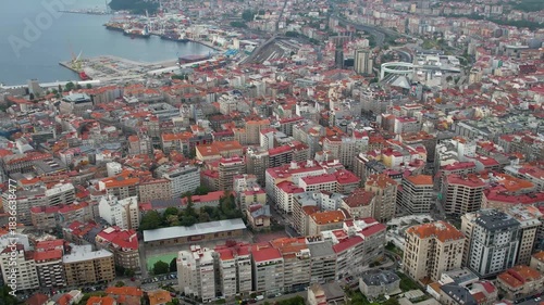 Aerial panorama view around the downtown in the harbor city Vigo in Spain on a cloudy summer afternoon.