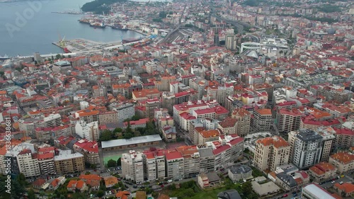 Aerial panorama view around the downtown in the harbor city Vigo in Spain on a cloudy summer afternoon.