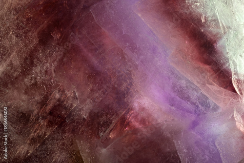 red and pink fluorite stone texture macro