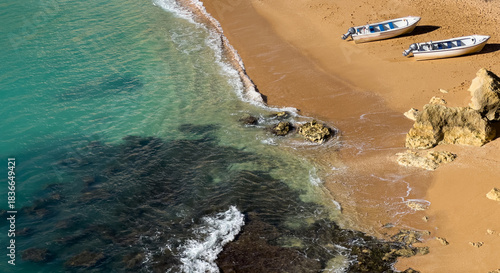  boats near a typical Algarve cave November 30, 2025 Lagoa Portugal