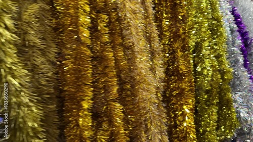 Christmas multicoloured tinsel background. 4K