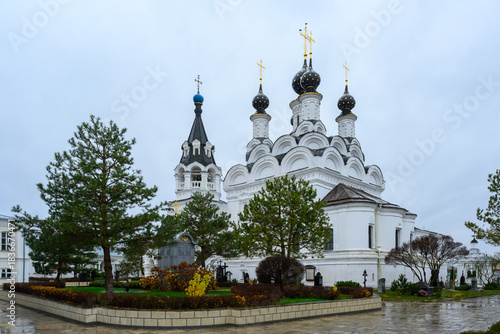 Explore the serene beauty of Murom's historic church under cloudy skies