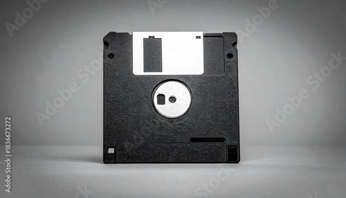 Plakat w ramie Black floppy disk with white label for retro data storage 