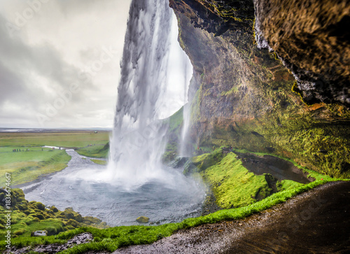Seljalandsfoss waterfall, part of Seljalands River that has its origin in the volcano glacier Eyjafjallajokull, Iceland
