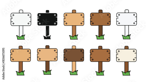 A collection of ten blank wooden and metal signboards on posts in grass, in various colors and styles.