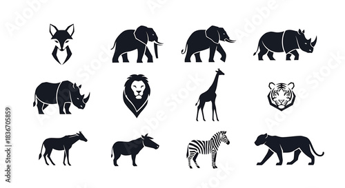 Silhouetted African Wildlife Icons Featuring Elephant, Lion, Giraffe, Rhino, and Zebra in Minimalist Black Design, Vector Illustration