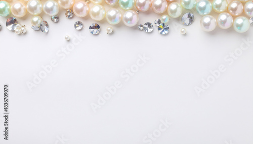 Sophisticated arrangement of lustrous pearls and sparkling crystals forming decorative border. Perfect for luxury branding, wedding invitations, jewelry marketing, and premium product presentations