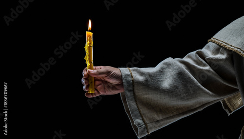 Ancient monastery ritual captured through flickering candlelight illuminating weathered hands in sacred ceremony