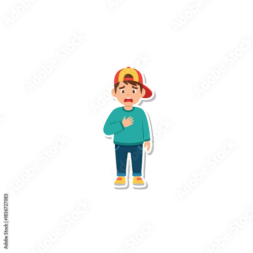 Young boy wearing a red and yellow baseball cap teal sweater blue jeans and white sneakers clutches his chest in distress or pain isolated on black background