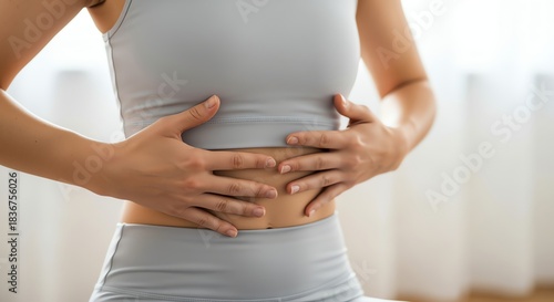 Wallpaper Mural Woman Holding Stomach, Abdomen, Pain, Health, Wellness Concept. Torontodigital.ca