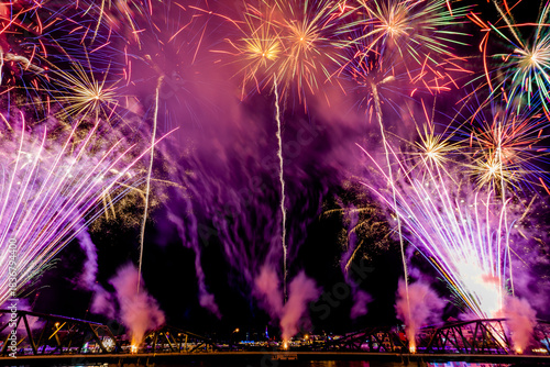 The blurred background of fireworks (light trails) is beautiful at night, seen in the New Year holidays, Christmas events, for tourists to take pictures during public travel.