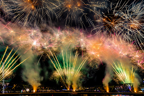 The blurred background of fireworks (light trails) is beautiful at night, seen in the New Year holidays, Christmas events, for tourists to take pictures during public travel.