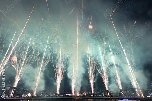 The blurred background of fireworks (light trails) is beautiful at night, seen in the New Year holidays, Christmas events, for tourists to take pictures during public travel.