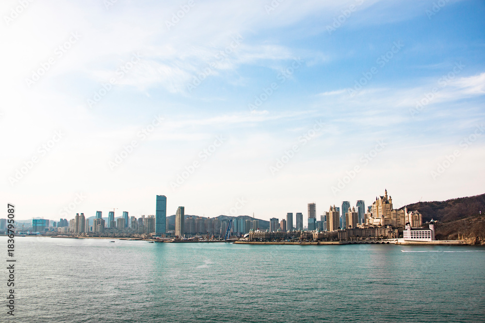 Fototapeta premium Blue Seaside City Skyline And Architecture