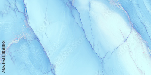 Abstract blue alcohol ink marble texture with soft veins soft gradients and translucent layers.