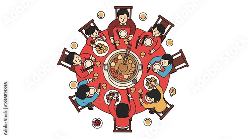 Overhead view of a group of people enjoying a meal together around a circular dining table filled with food